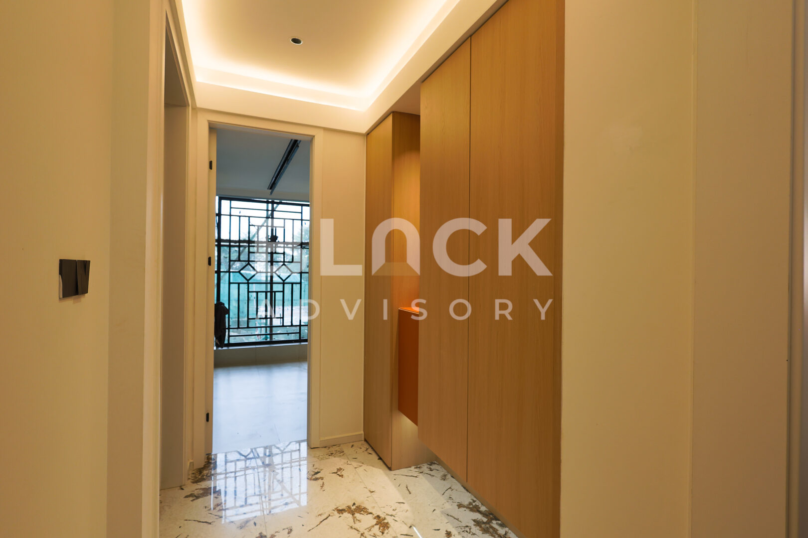 Amani Residence show apartment hallway with timber wall panelling
