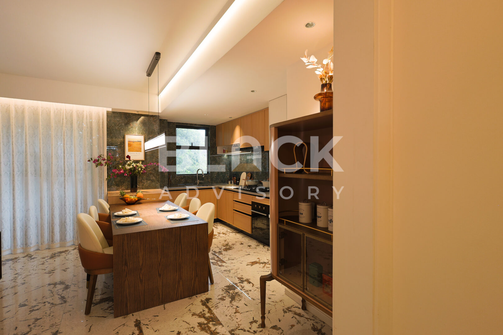 Amani Residence show apartment dining table and display cabinet beside the windows