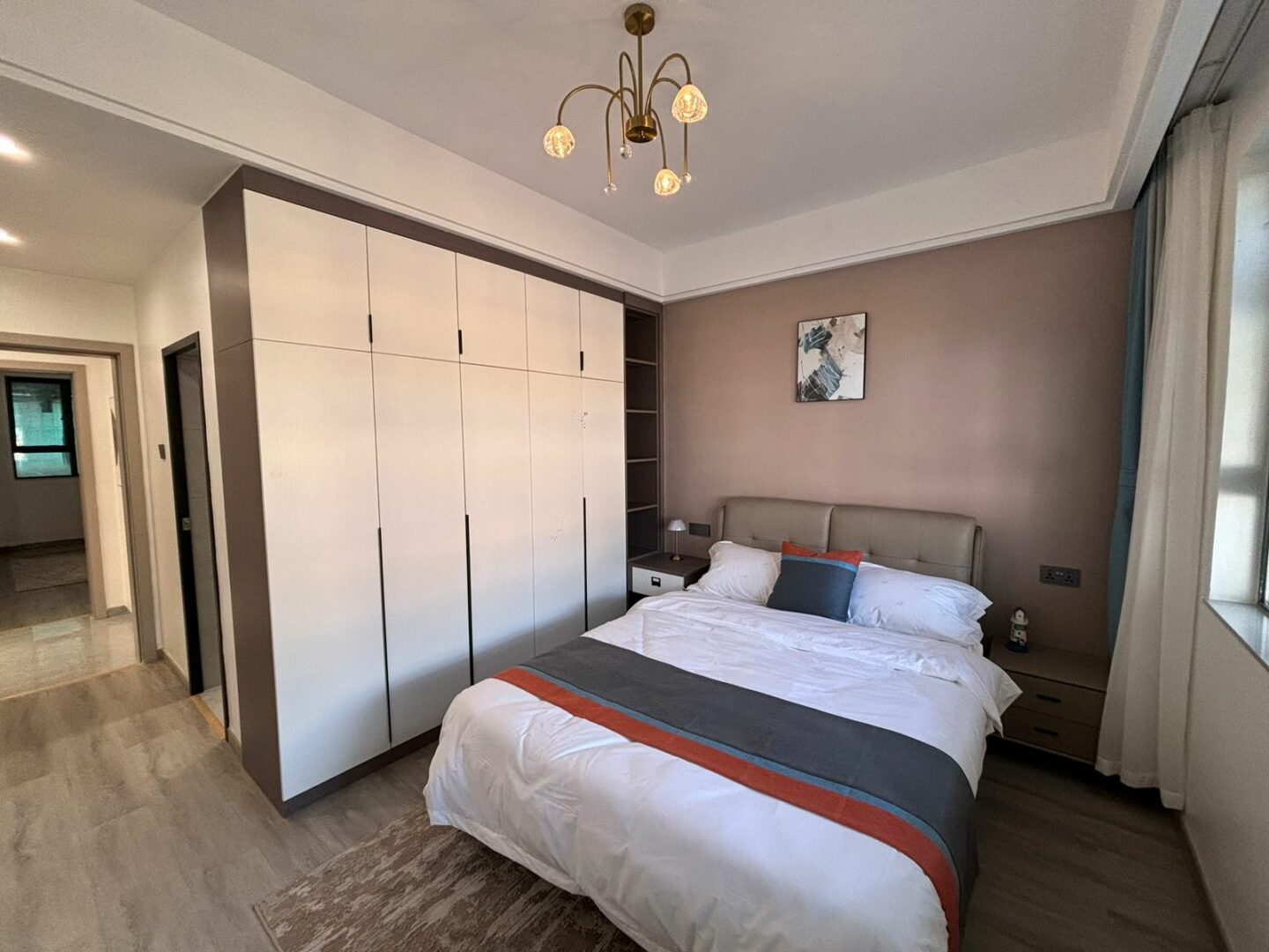 Bahari Homes Spacious bedroom with built-in wardrobes.