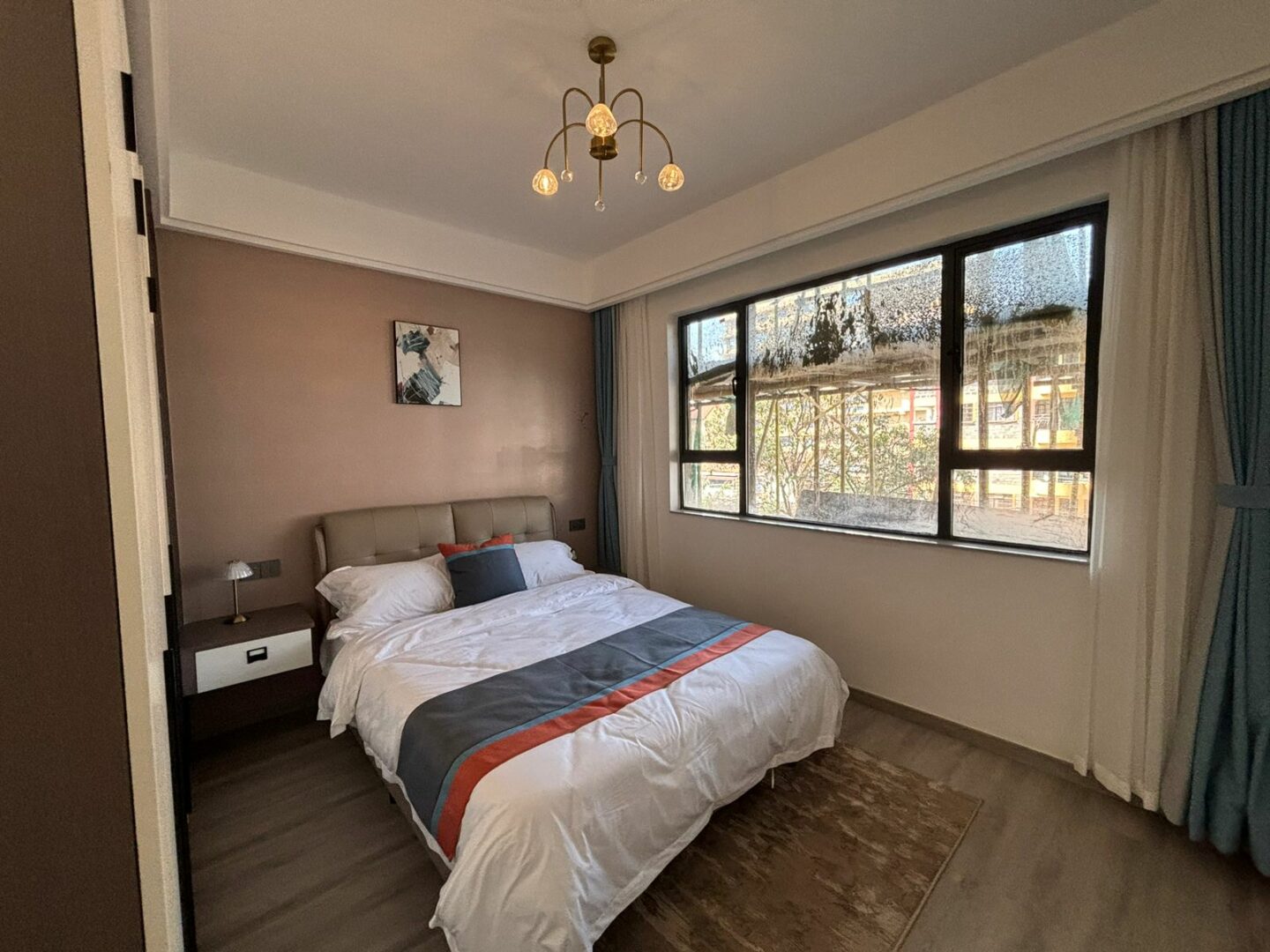 Bahari Homes Spacious bedroom with built-in wardrobes.
