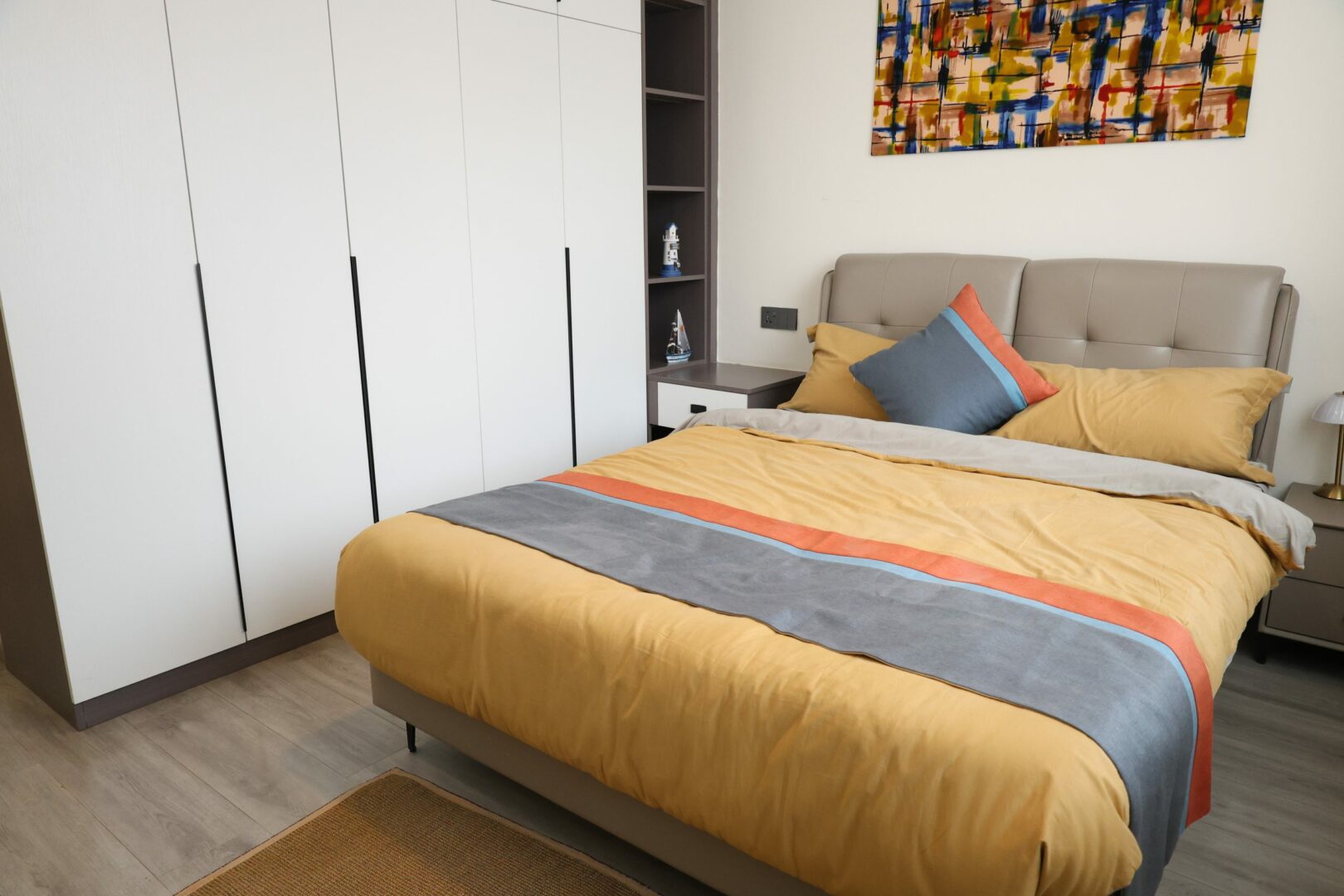 Bahari Homes Spacious bedroom with built-in wardrobes.
