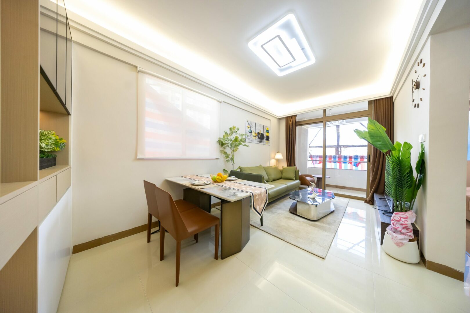 Spacious sitting area with large windows for natural light.