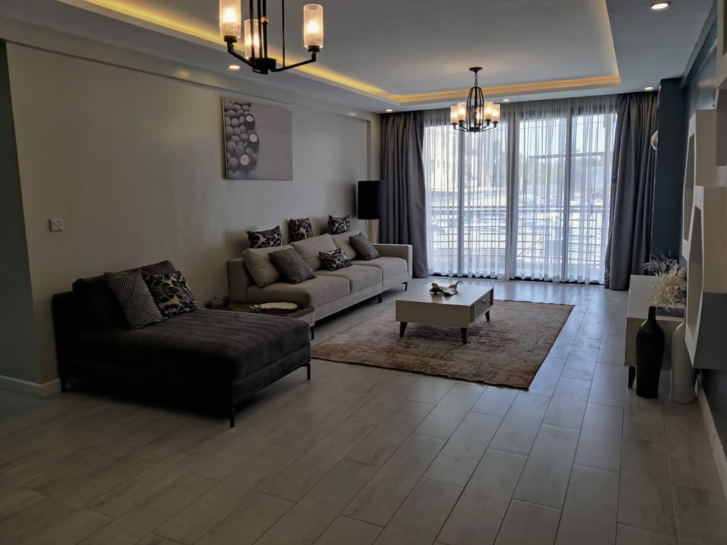 Acton Park Spacious sitting area with large windows for natural light. Open-plan living space designed for comfortable family time. Bright, airy sitting area with ample room for furnishing. Sitting area with direct access to the balcony.