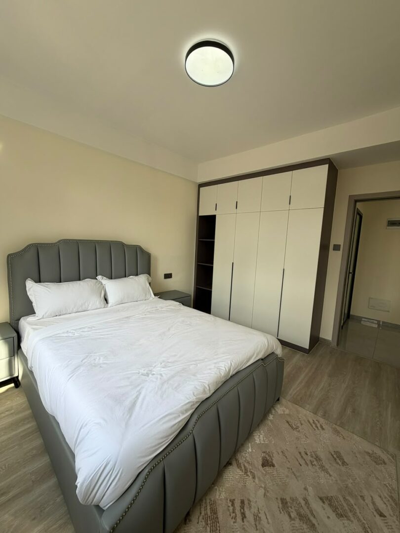 Bahari Homes Spacious bedroom with built-in wardrobes.