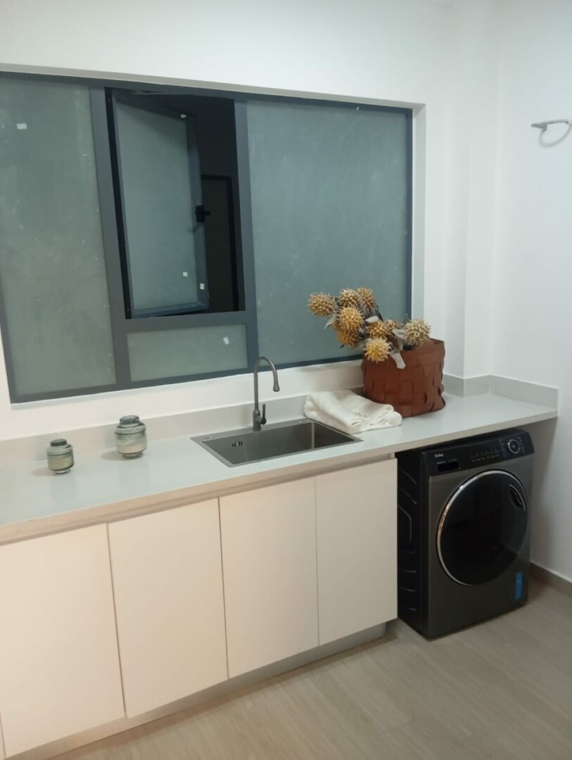 Royal Legend Dedicated laundry area within the unit