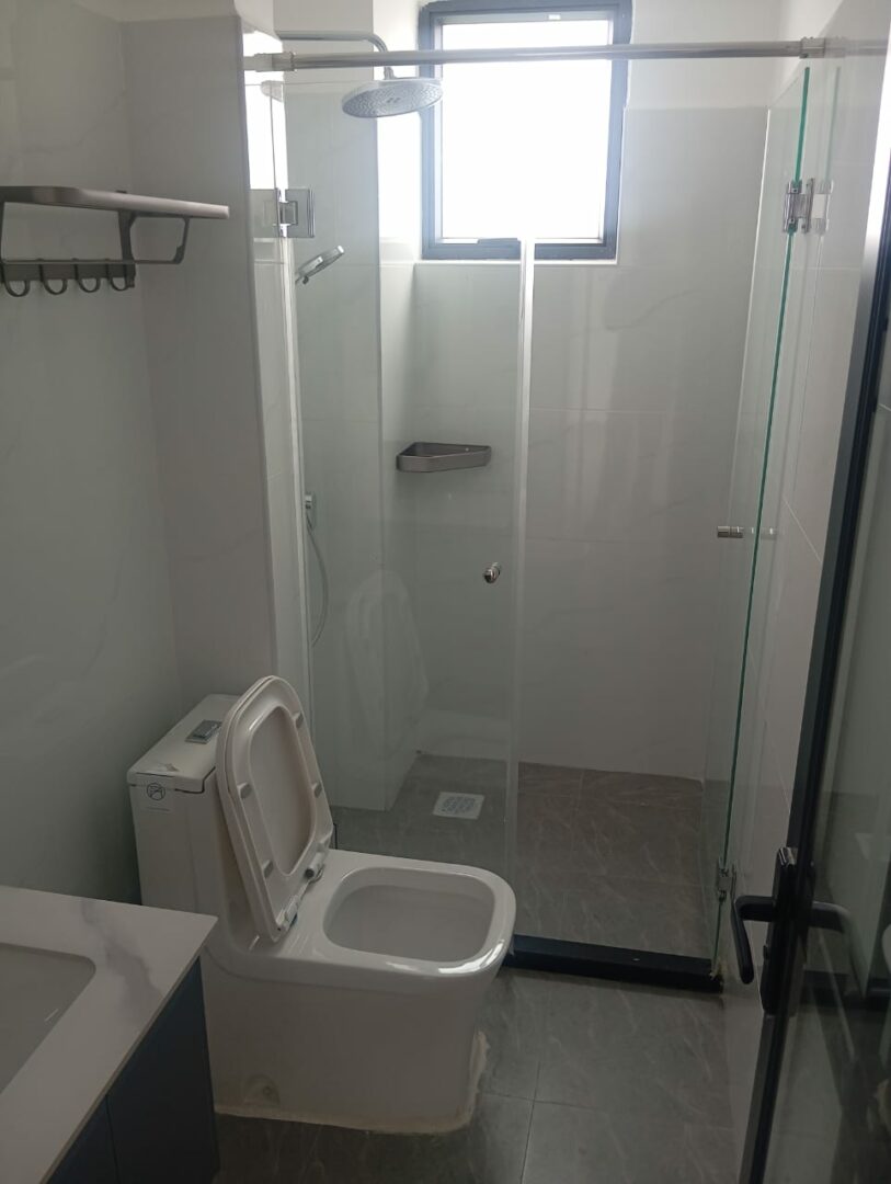 Serenity Residency Bathroom fitted with contemporary finishes.