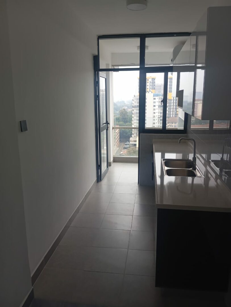 Serenity Residency Modern fitted kitchen with sleek, functional finishes.