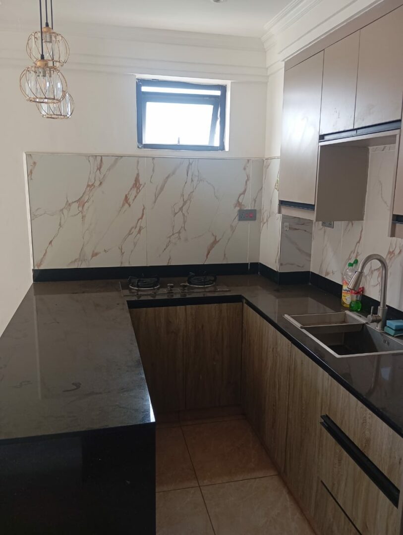 Padmore residences Modern fitted kitchen with sleek, functional finishes