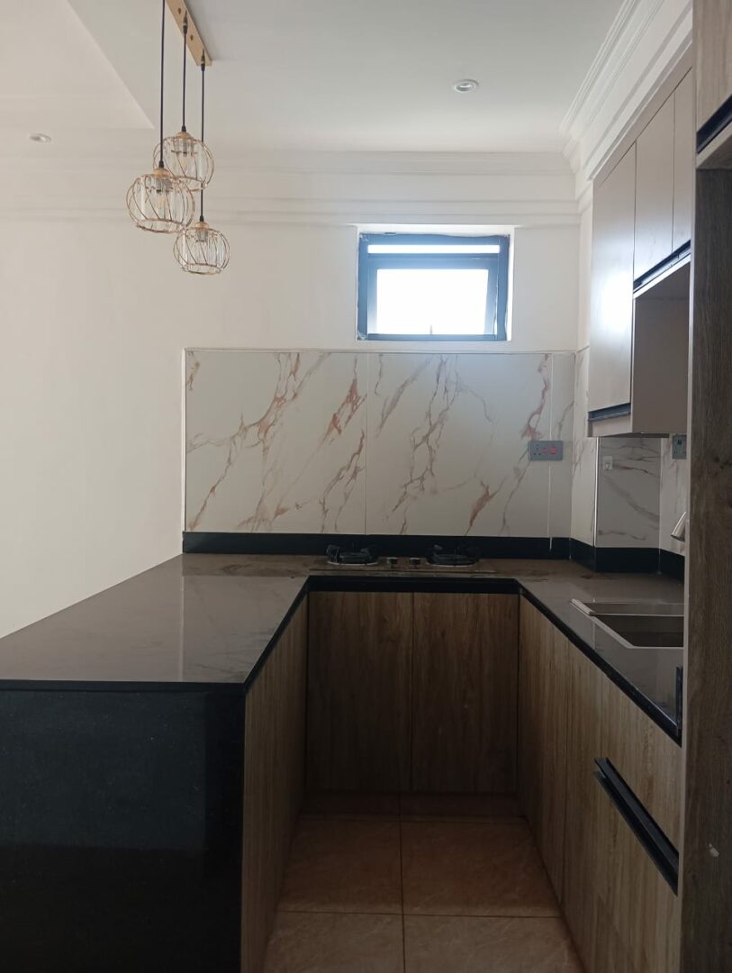 Padmore residences Modern fitted kitchen with sleek, functional finishes