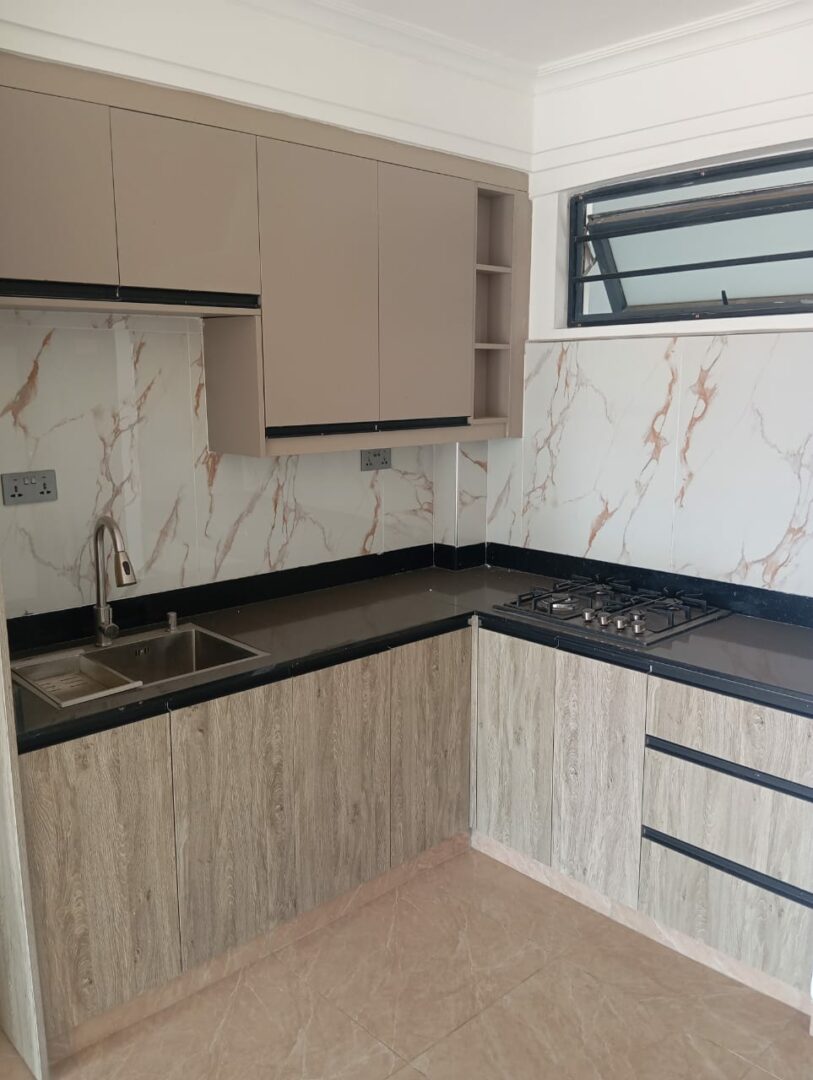 Padmore residences Modern fitted kitchen with sleek, functional finishes