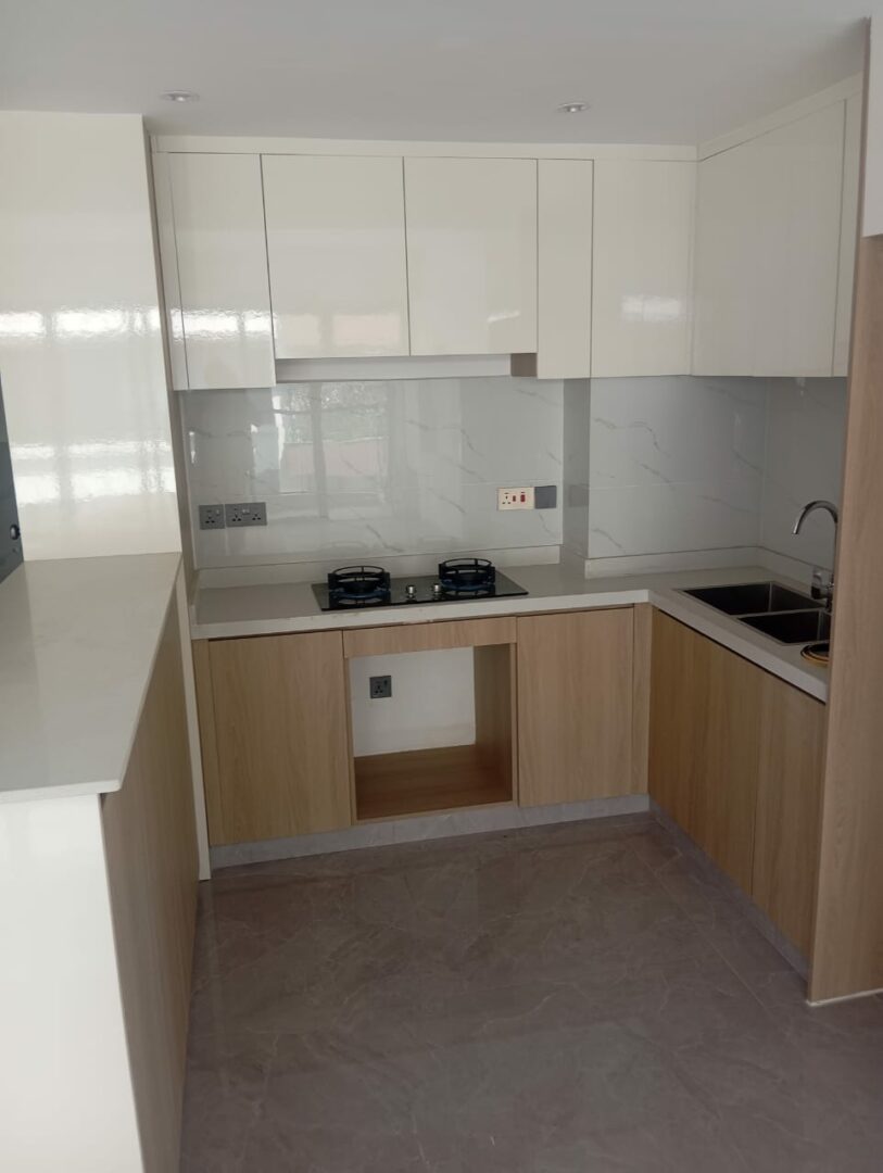 Riara one Well-equipped kitchen with ample counter and storage space