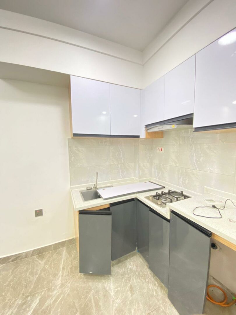 Heartland Gardens Modern fitted kitchen with sleek, functional finishes.