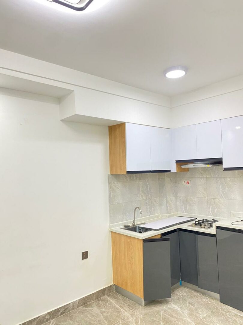 Heartland Gardens Modern fitted kitchen with sleek, functional finishes